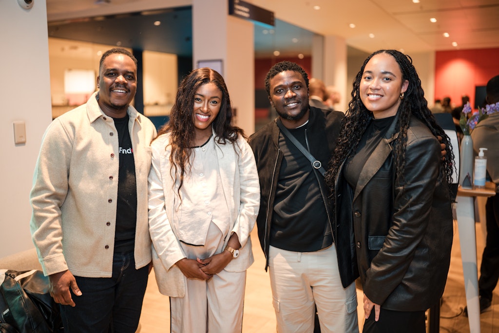 James Otemolu with guests at an Eagle Labs event